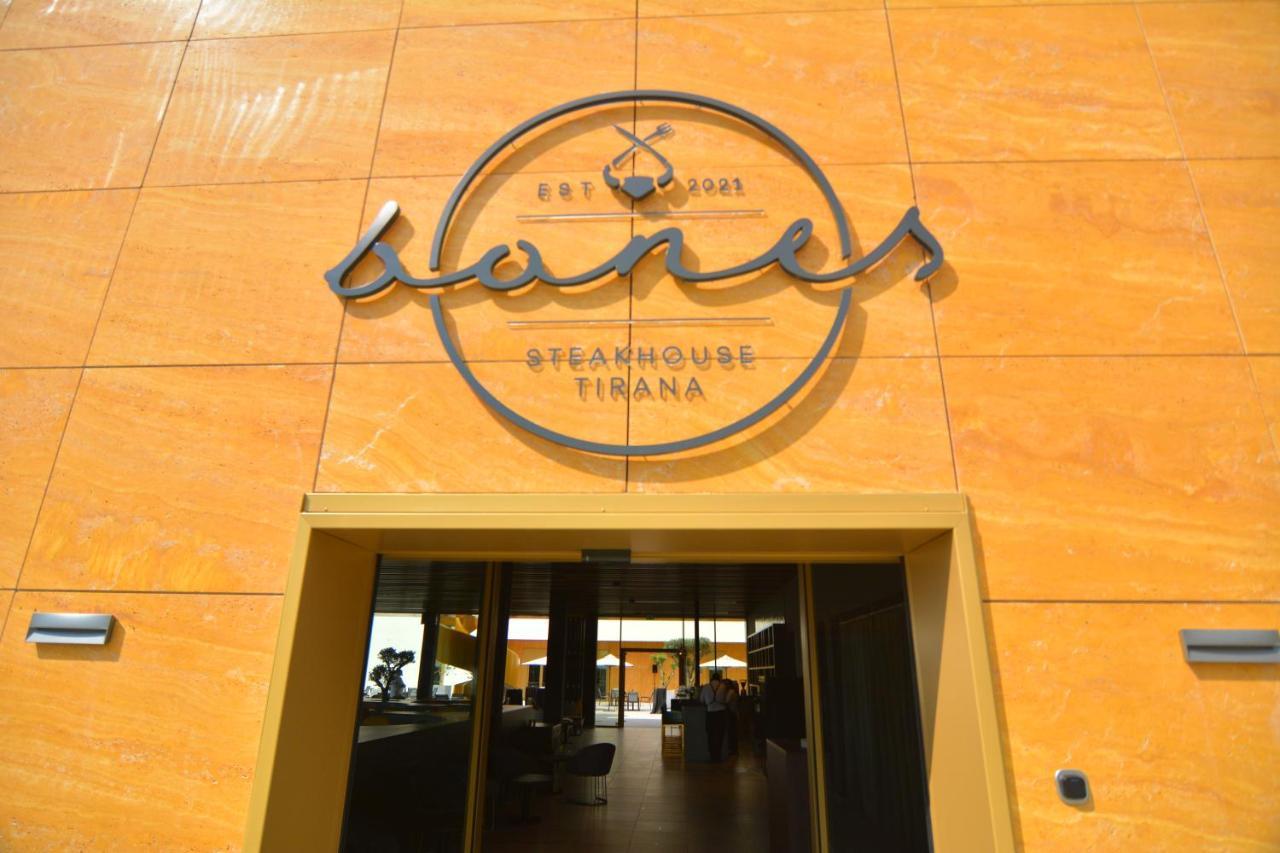 Rinas Mk Hotel Tirana מראה חיצוני תמונה Entrance of the restaurant